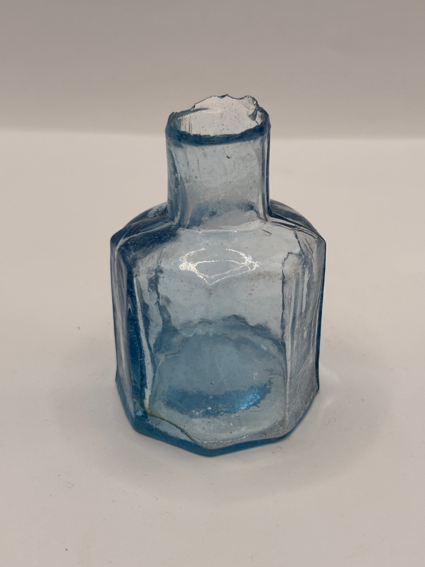 Old ice blue inkwell, ink bottle