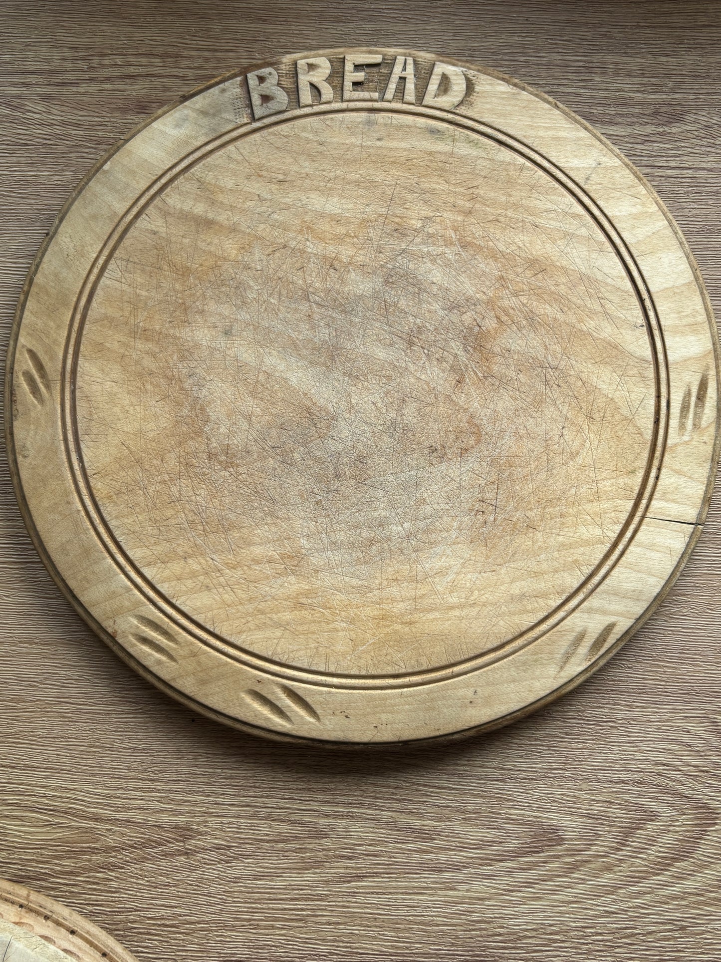 Old carved bread board, Bread