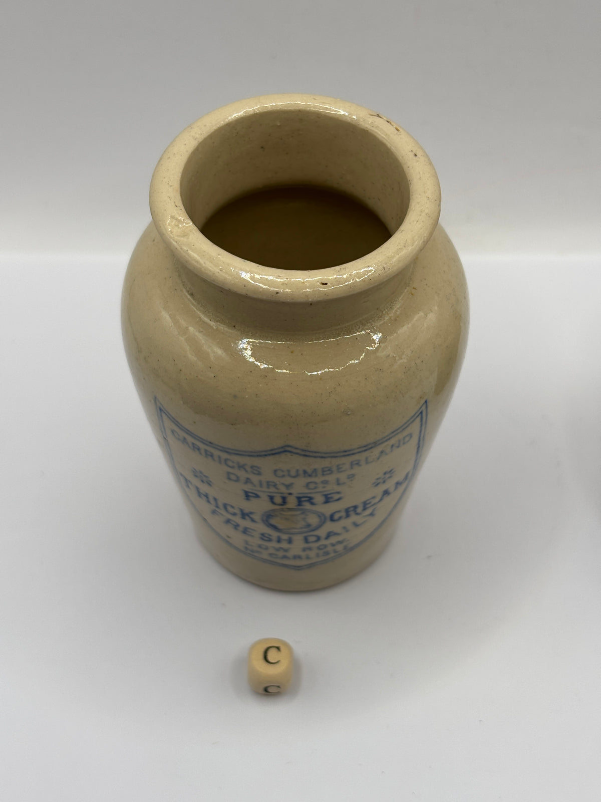 Old advertising cream pot, Carricks Cumberland dairy (c)