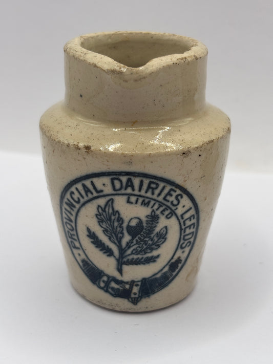 Old advertising cream pot, Provinical dairies Leeds. Chipped