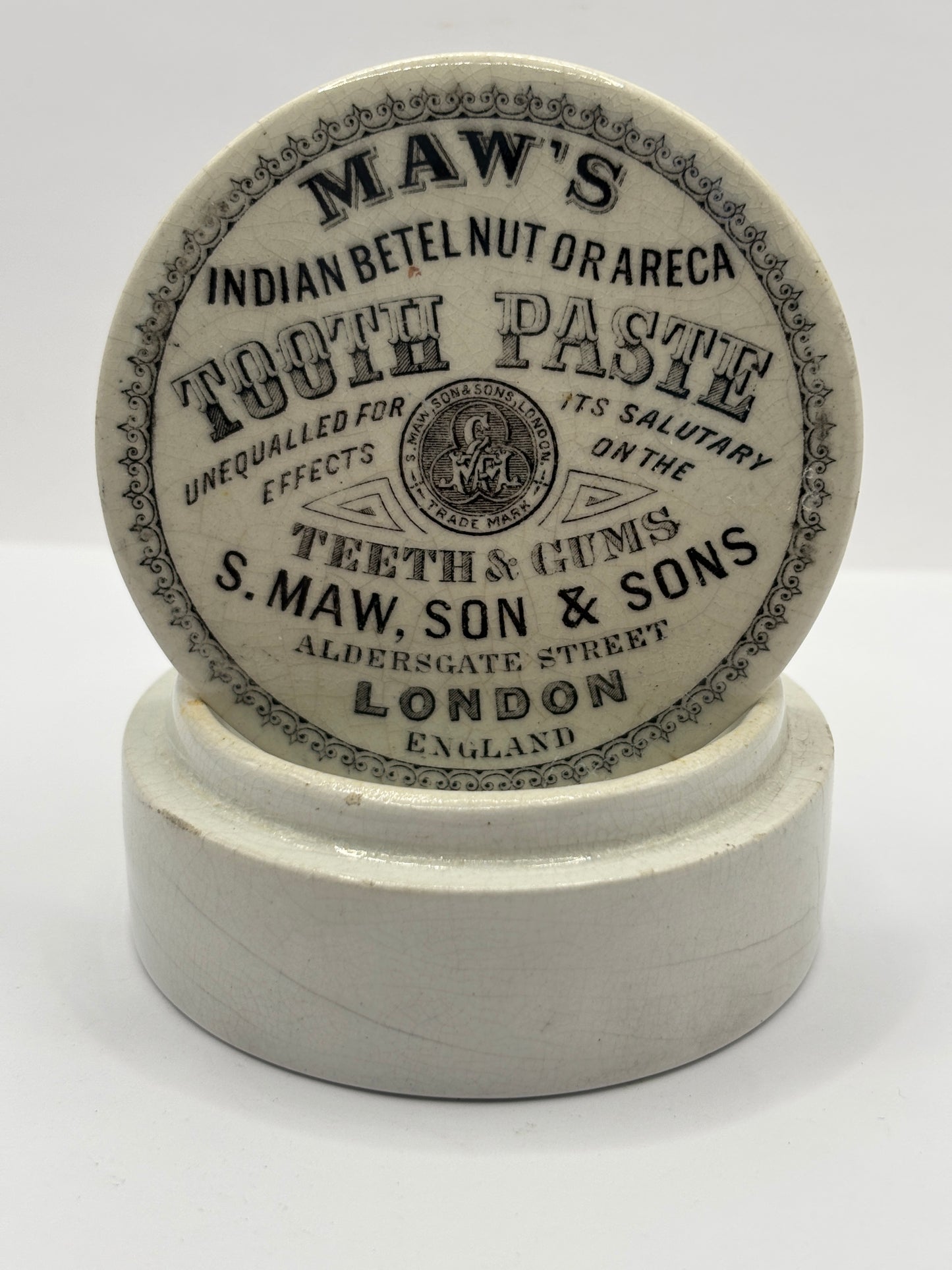 Old advertising lid and base, Maws indian nut or areca toothpaste