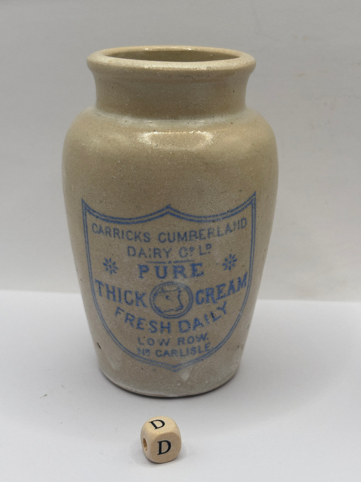 Old advertising cream pot, Carricks Cumberland dairy (D)