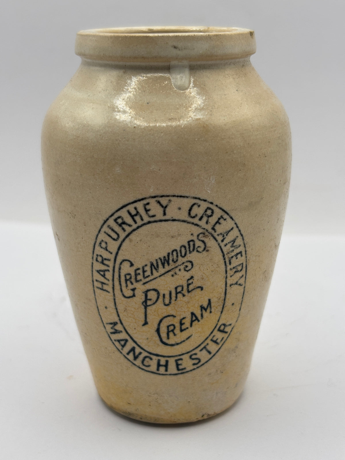 Old advertising cream pot, Harpurhey creamery, Greenwoods pure cream