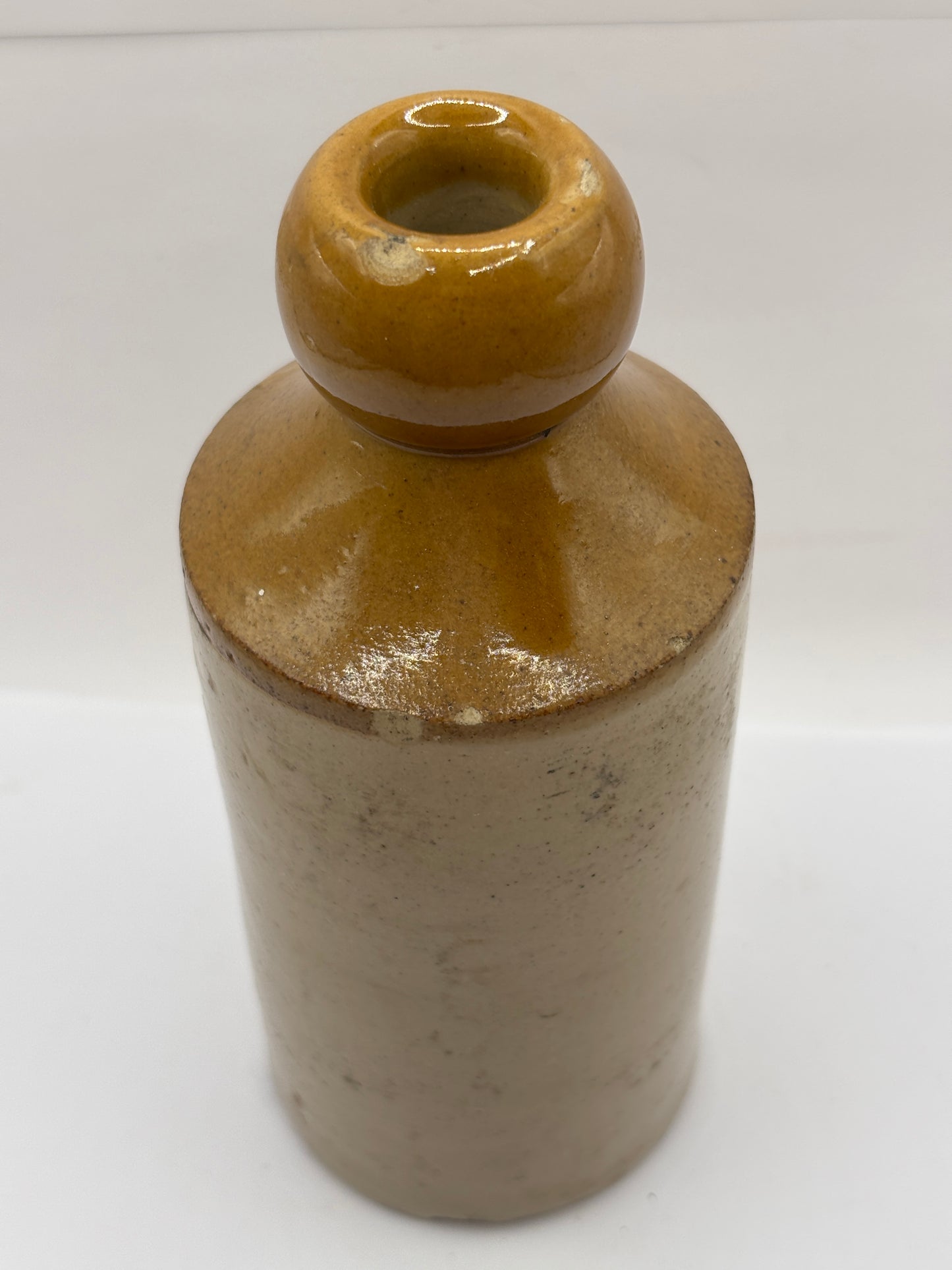 Old stoneware ginger beer bottle, Trevett’s drinks