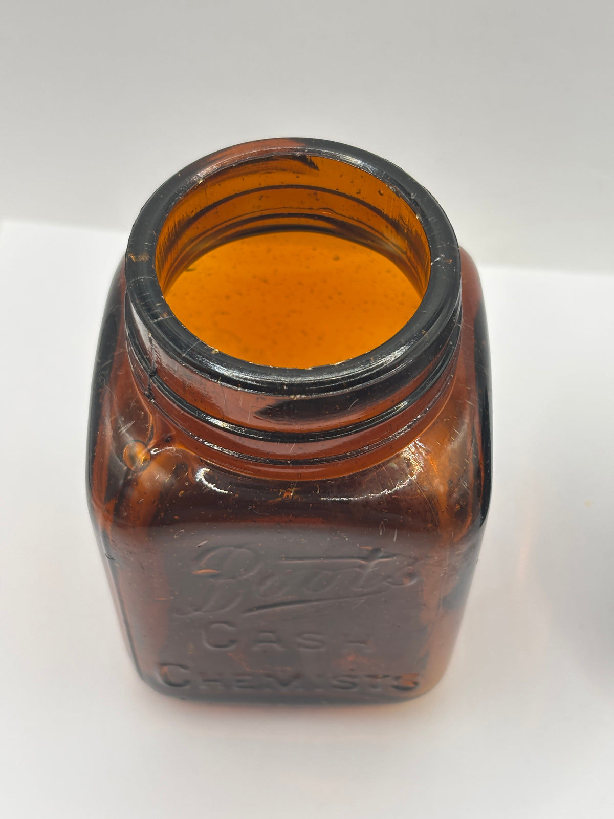 Old amber glass Boots Cash chemists jar 11.5cms