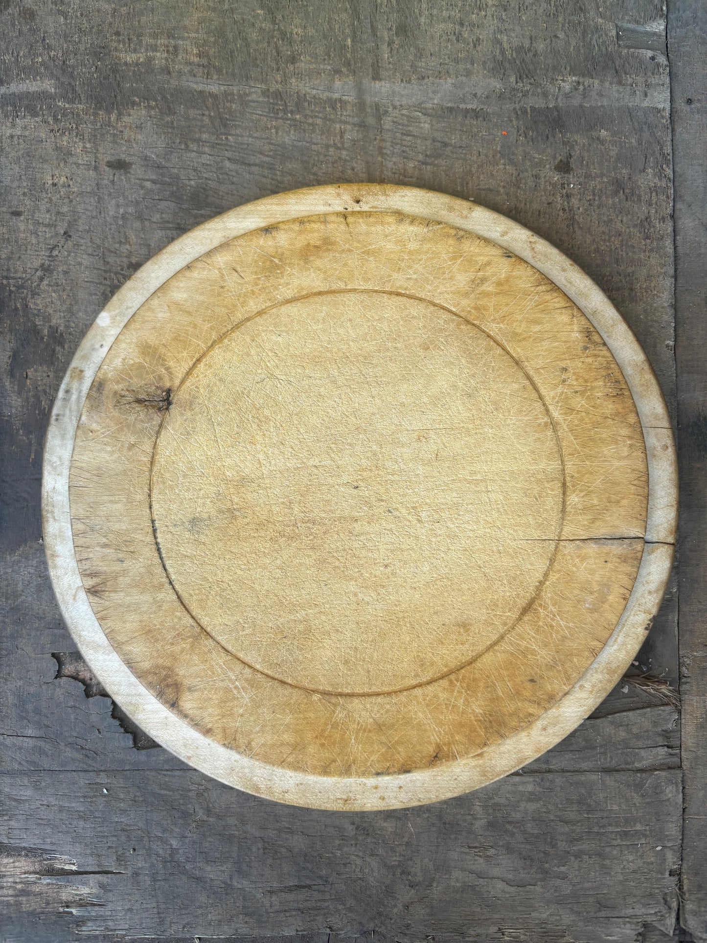 Old wooden carved bread board