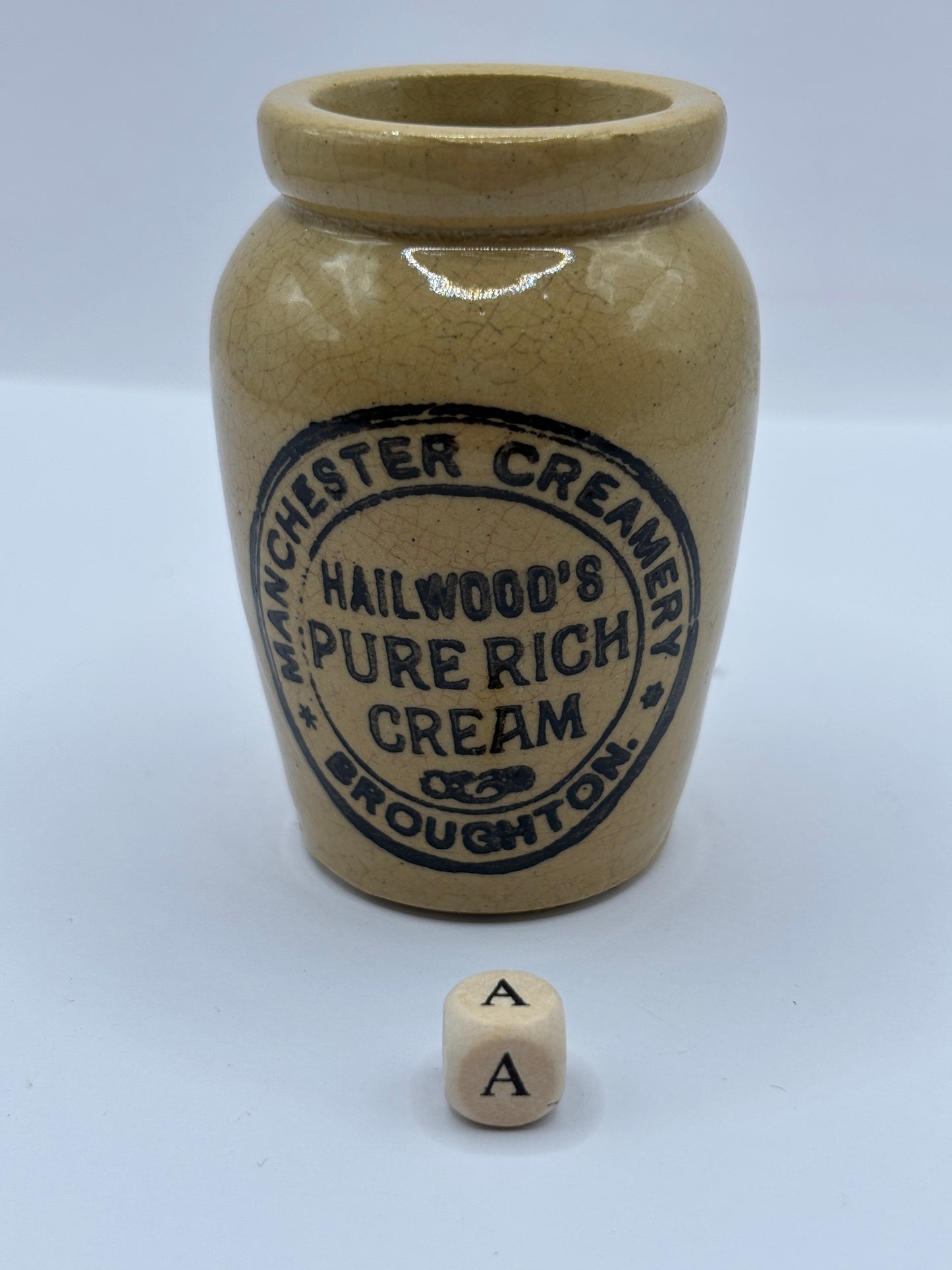 Old advertising cream pot, Manchester creamery Hailwoods cream (a) hairlined
