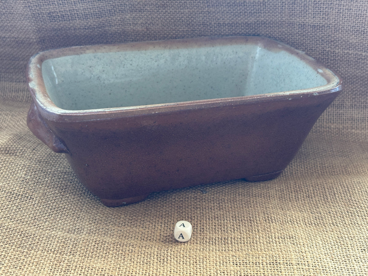 Old brown salt glaze stoneware pie dish (a)