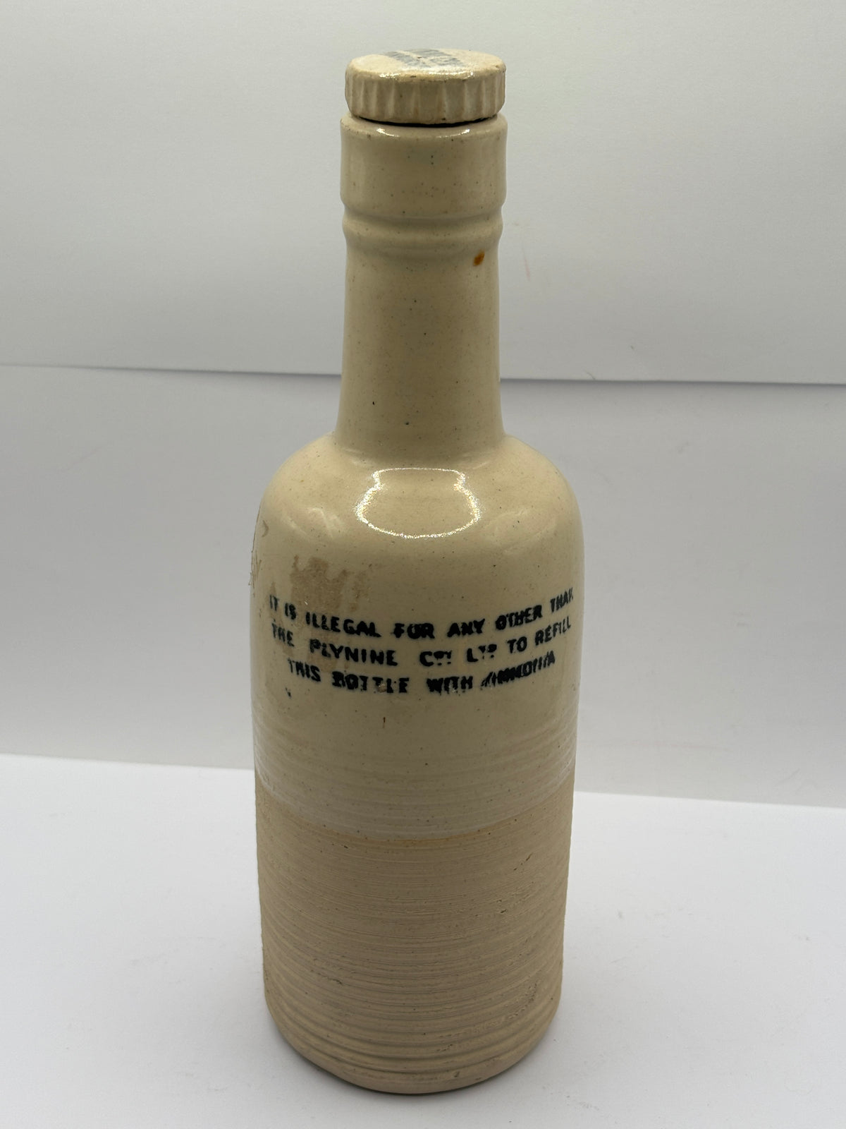 Old stoneware advertising bottle, Plynine household Ammonia with original stopper