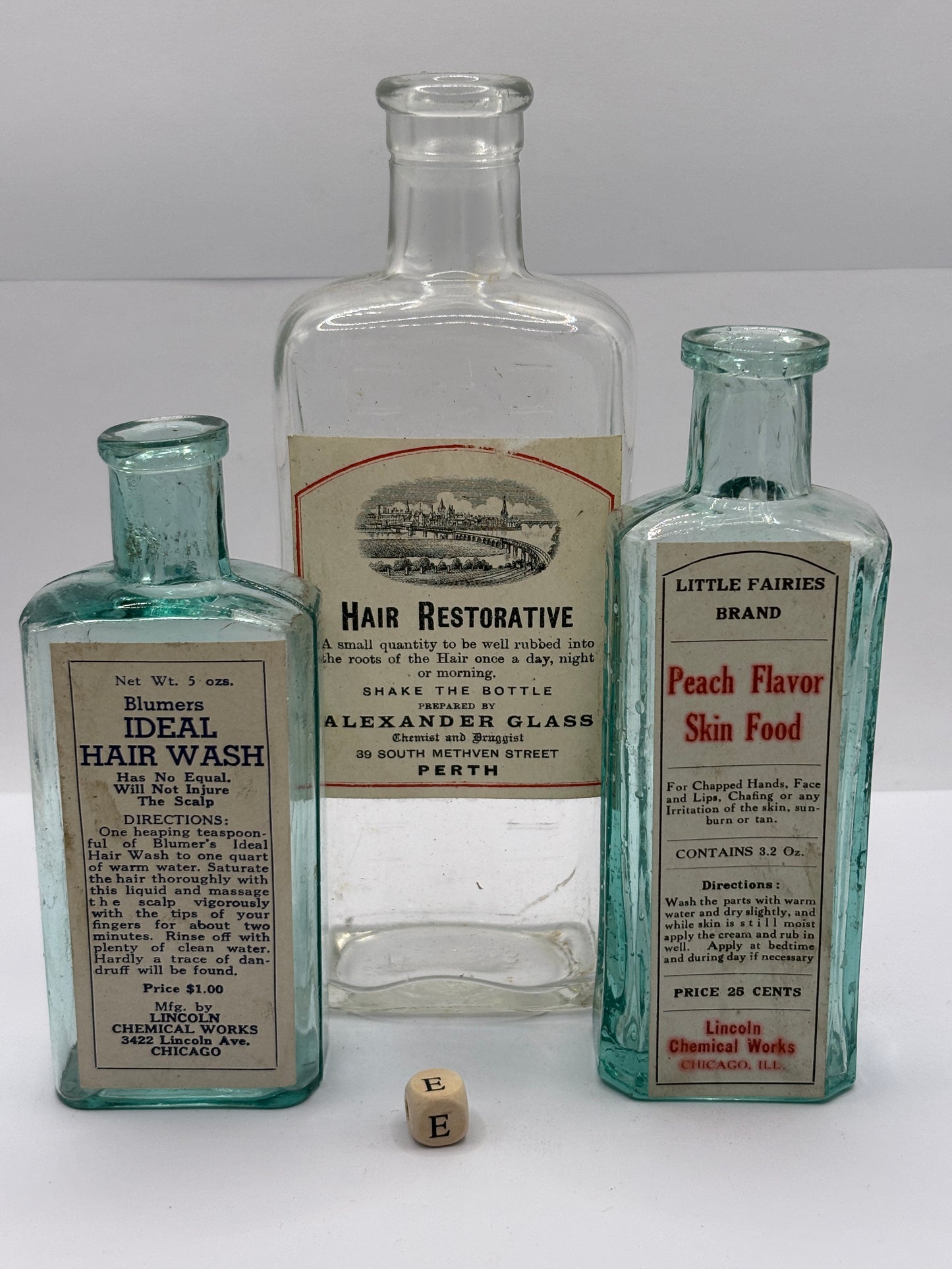 3 old chemist bottles with added labels (E)