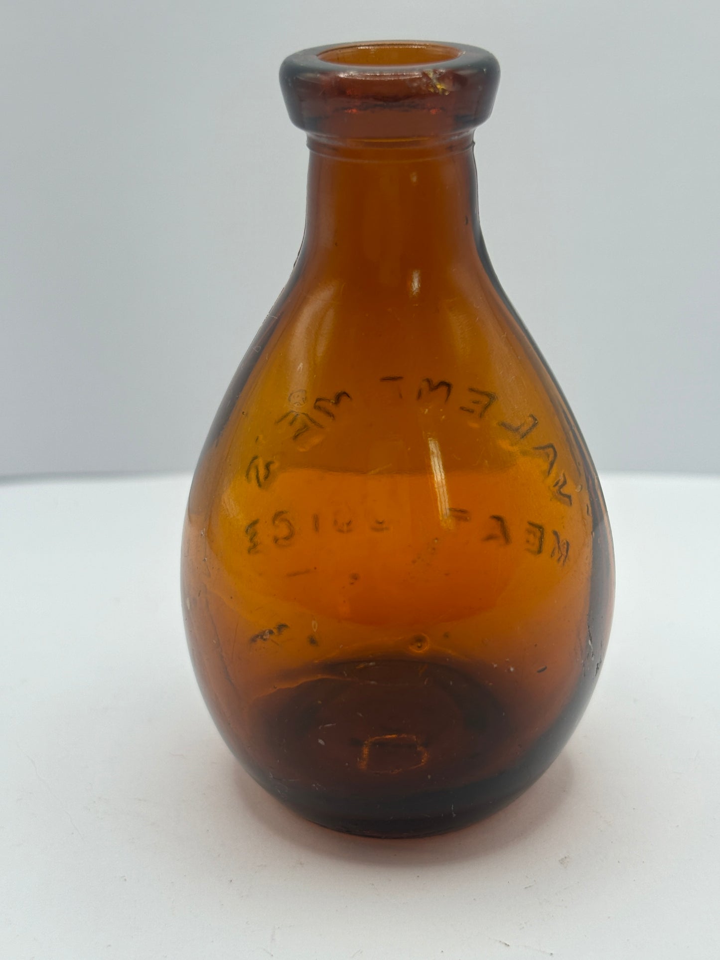 Small old amber glass valentines meat juices bottle