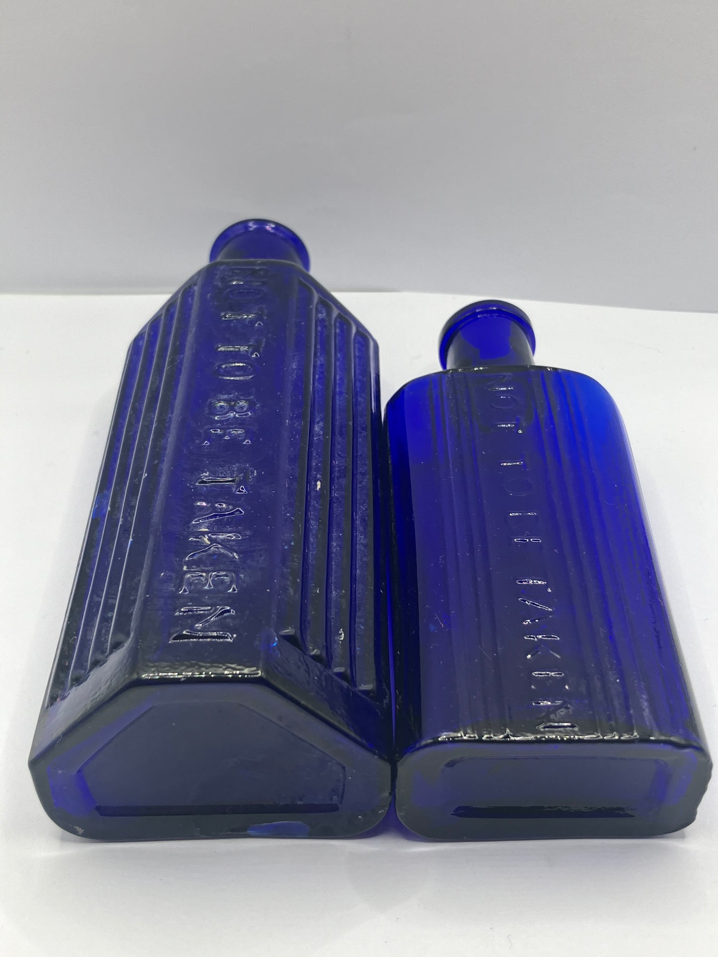 2 blue ribbed poison bottles, Not to be taken