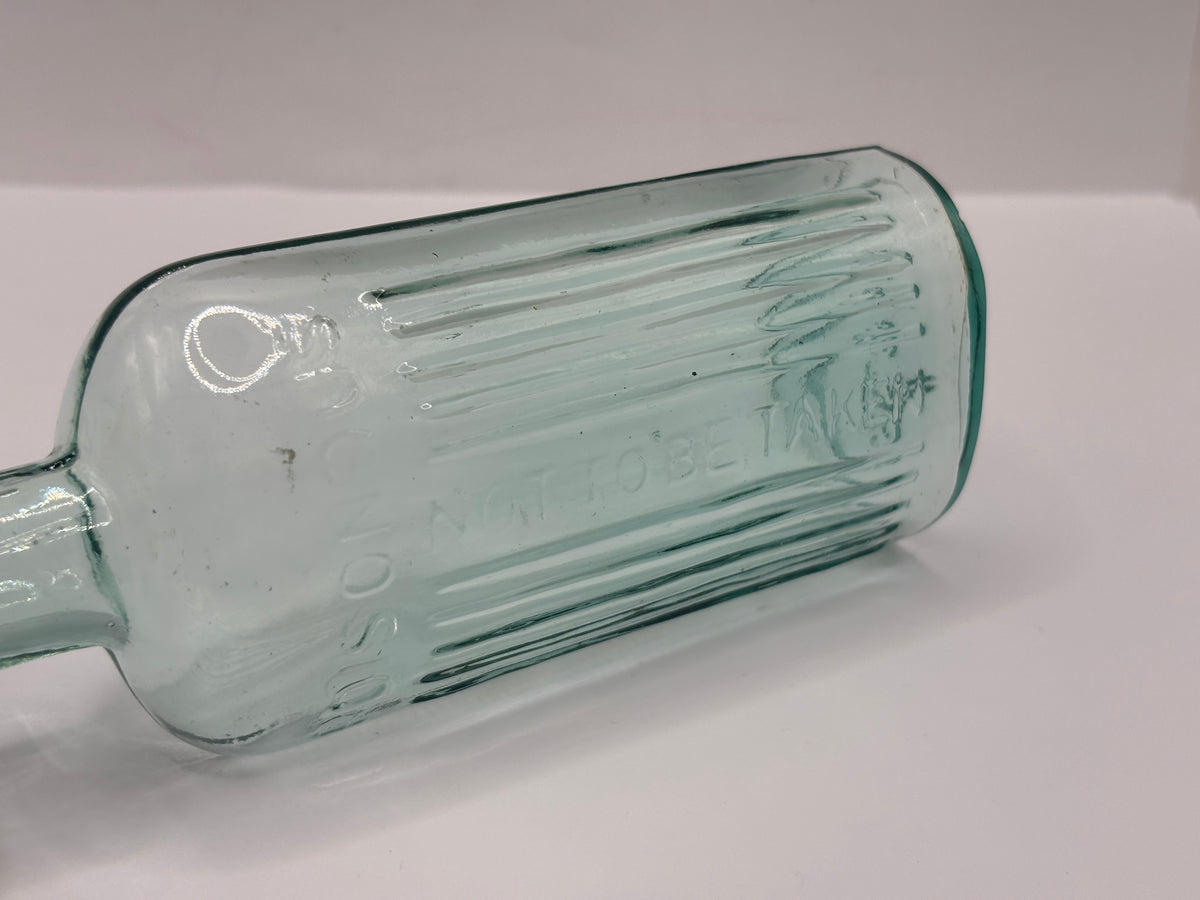 Old aqua glass poison bottle, POISONOUS Not to be taken