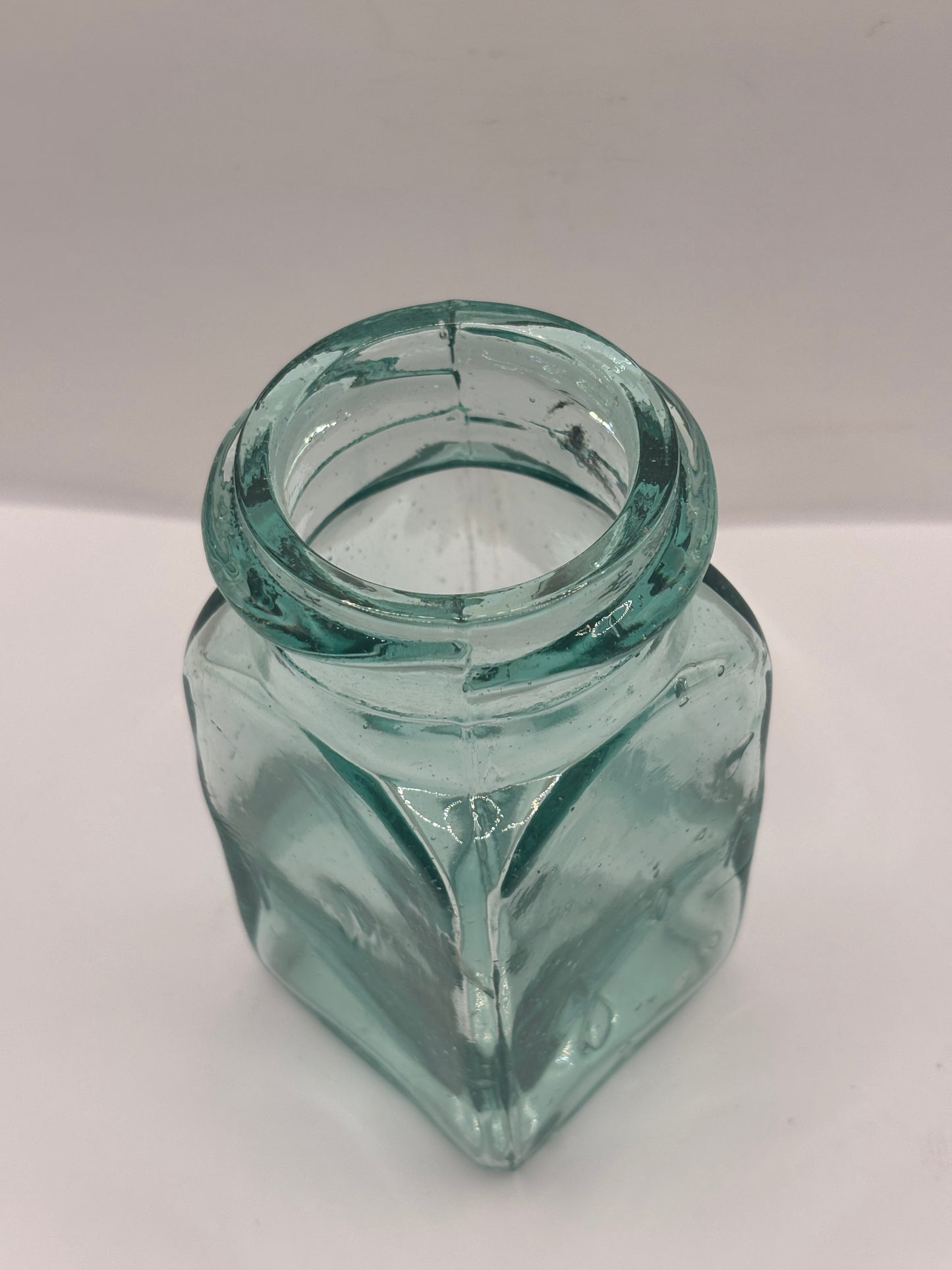 Old aqua glass pickle jar