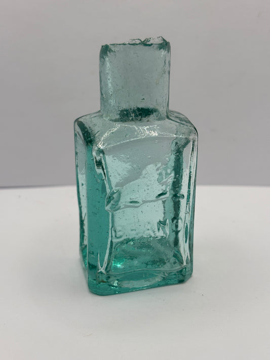 Old aqua glass advertising ink, ink bottle, inkwell. Lion brand ink