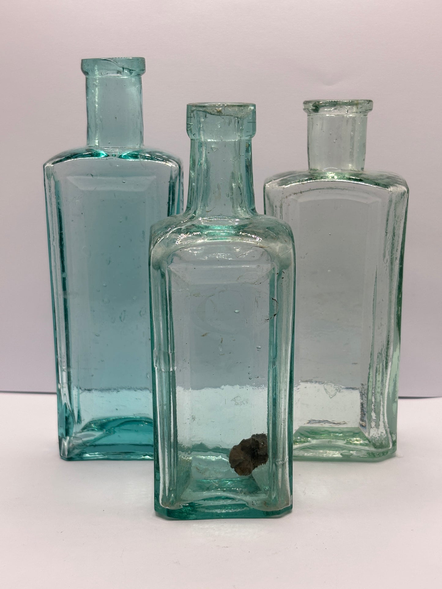 3 old aqua glass chemist bottles