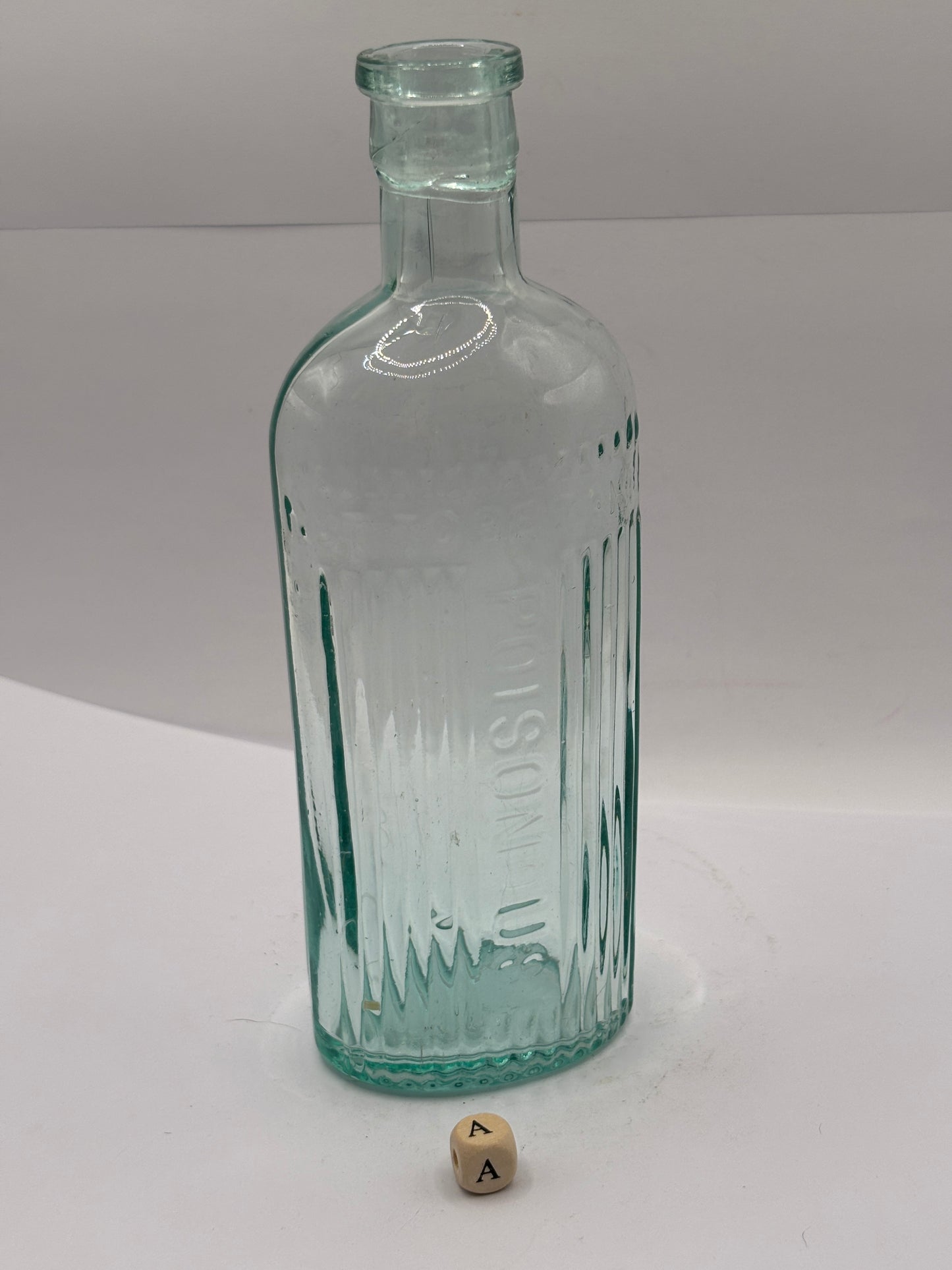 old aqua glass poison bottle, POISONOUS not to be taken (A)