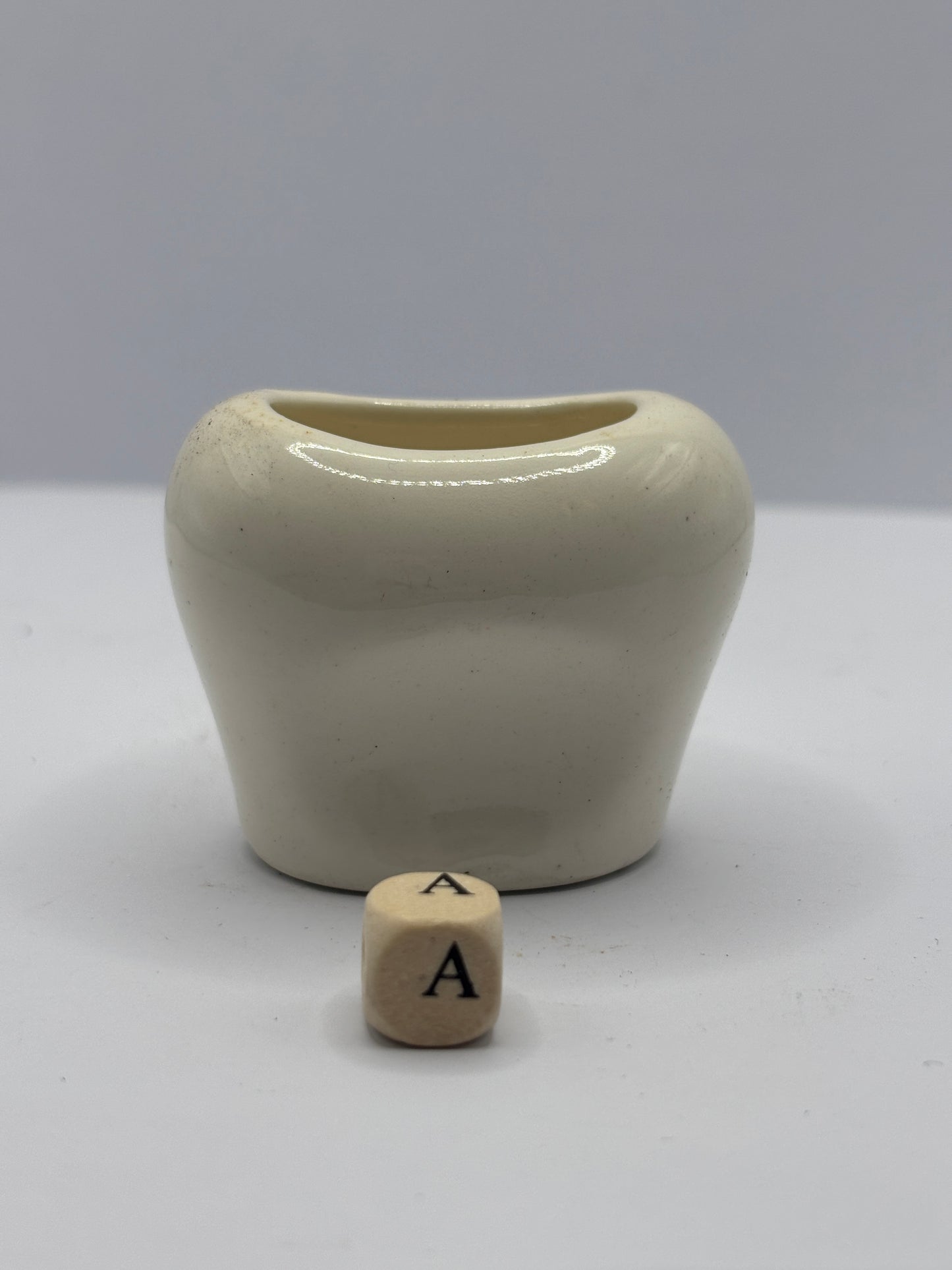 Old porcelain eye bath