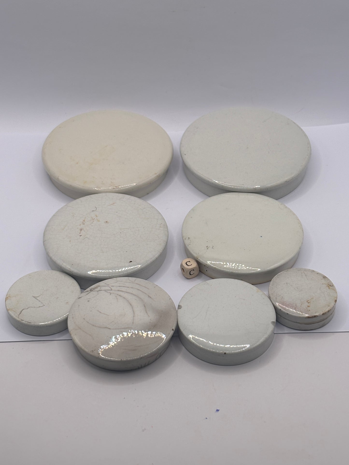 8 old plain stoneware lids, stacking lids (c)