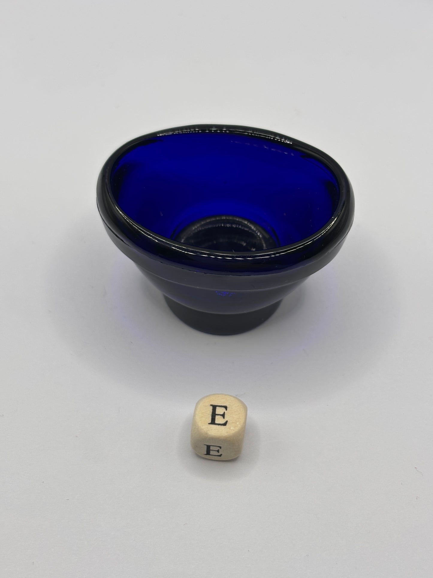 Old blue glass eye bath (e)