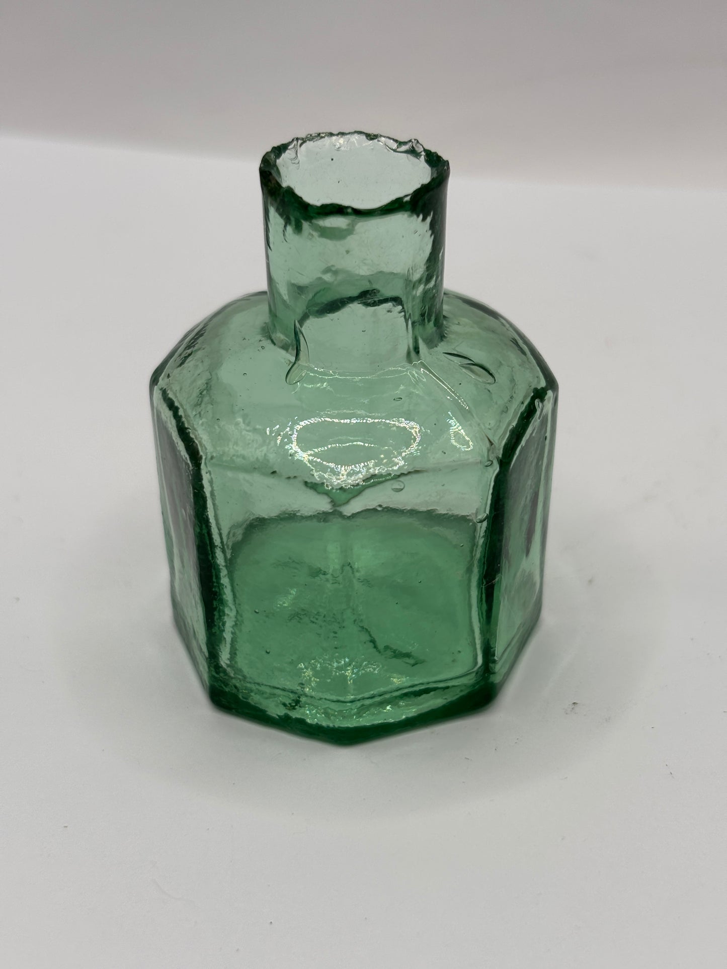 Old green glass ink bottle, inkwell, penny ink