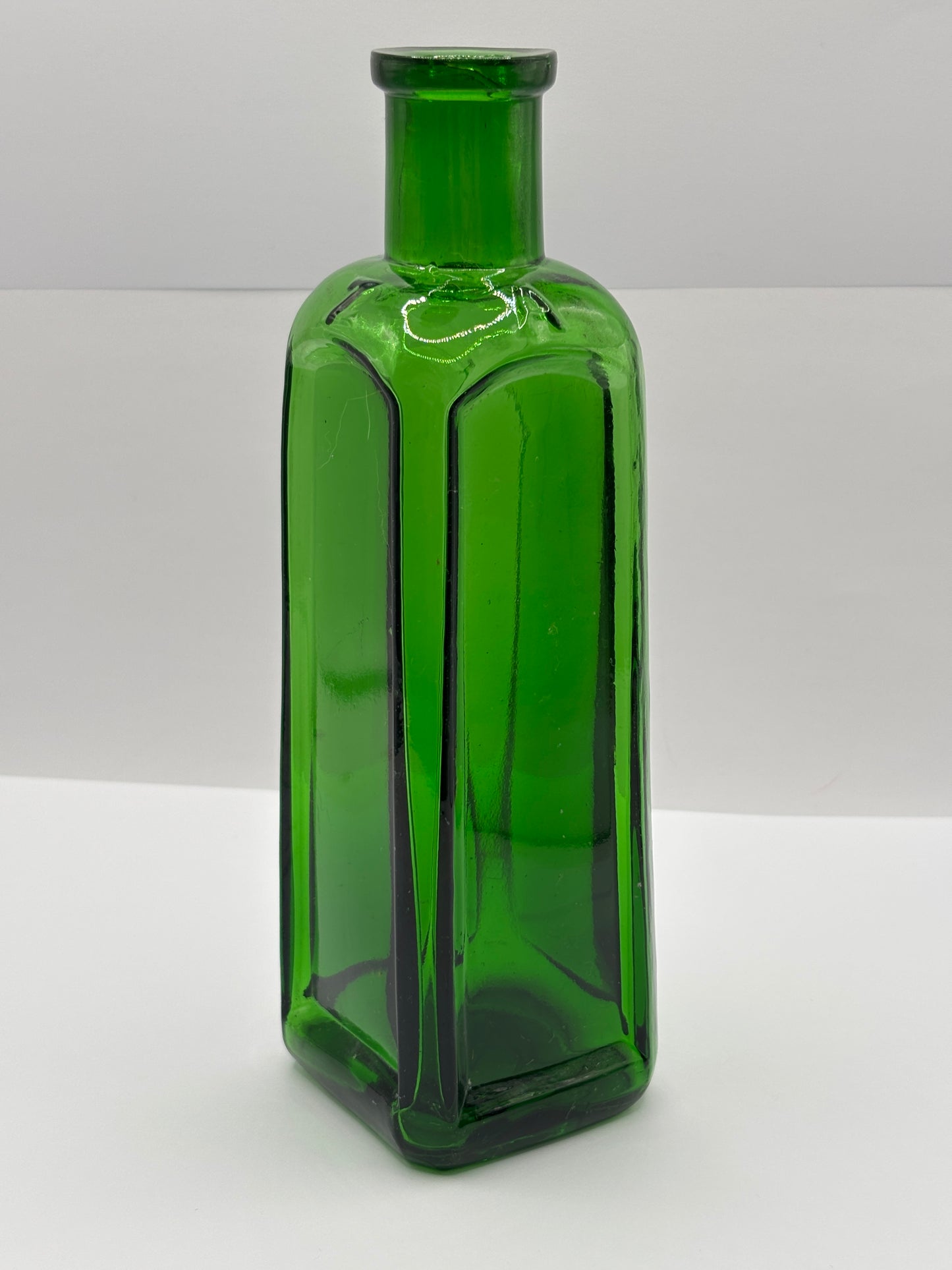 Old green glass Izal bottle