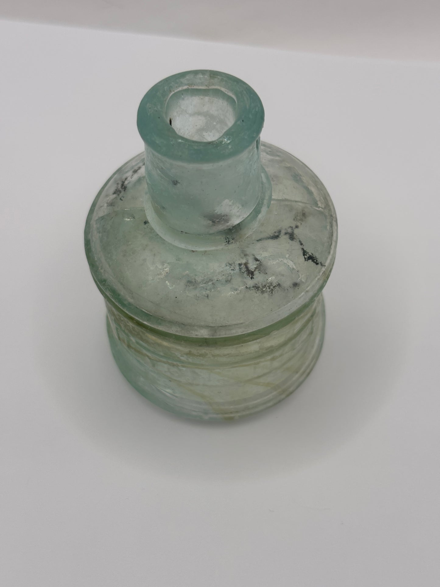 Old advertising inkwell,ink bottle. Lyons ink. Swirly