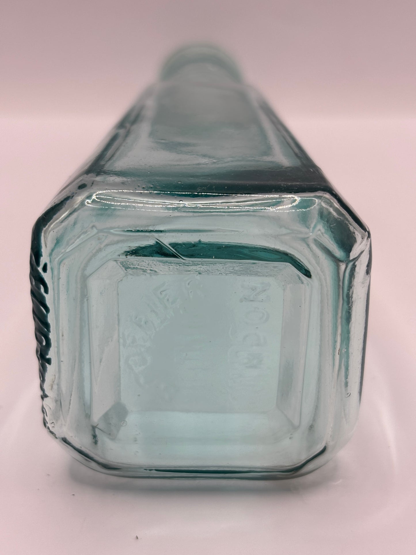 Old aqua glass sauce bottle