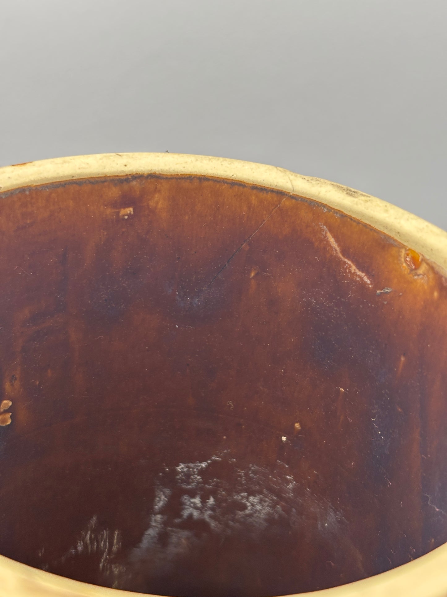 Old brown stoneware pot