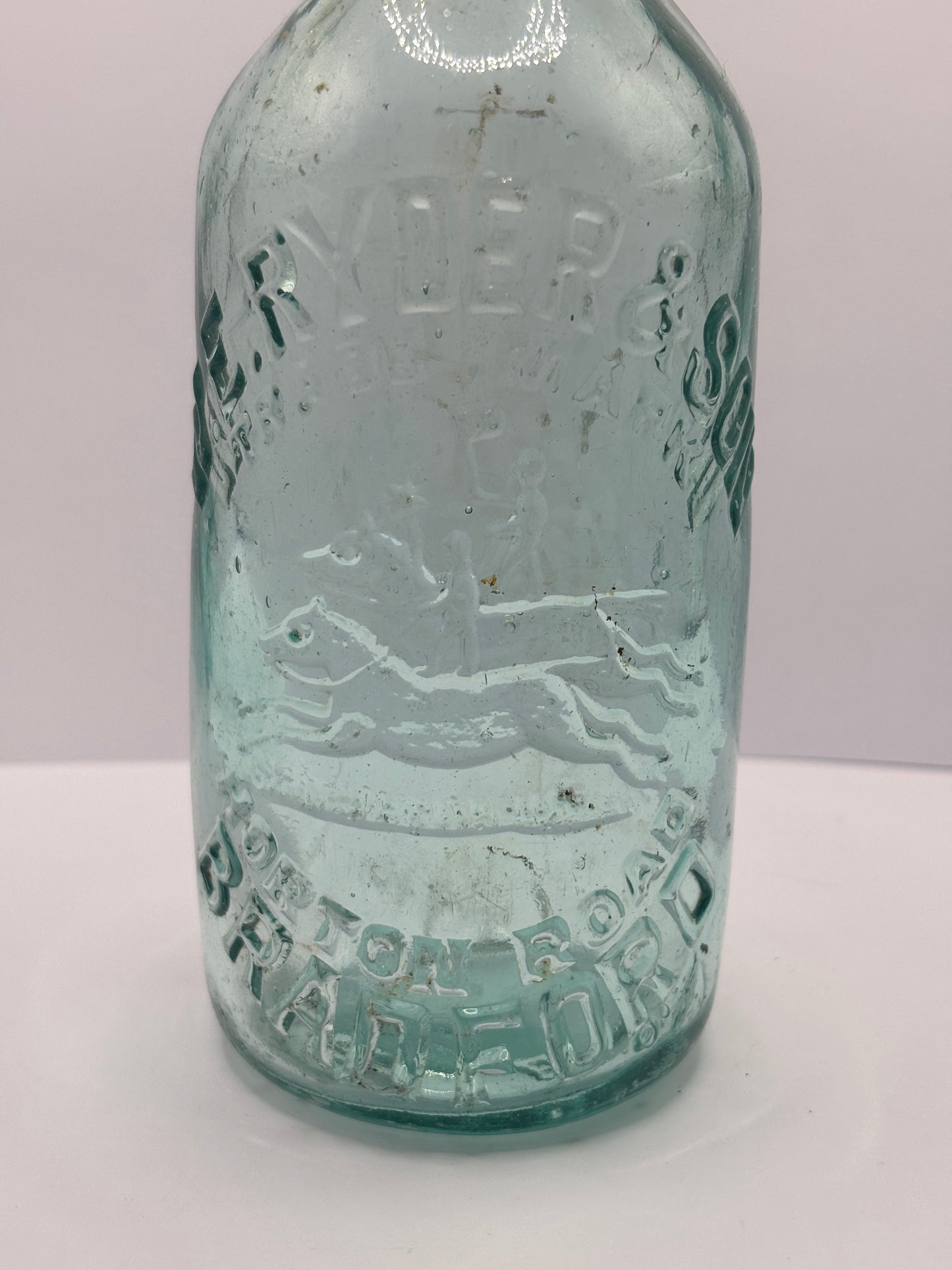 Old aqua glass Bradford beer bottle, Ryder & son