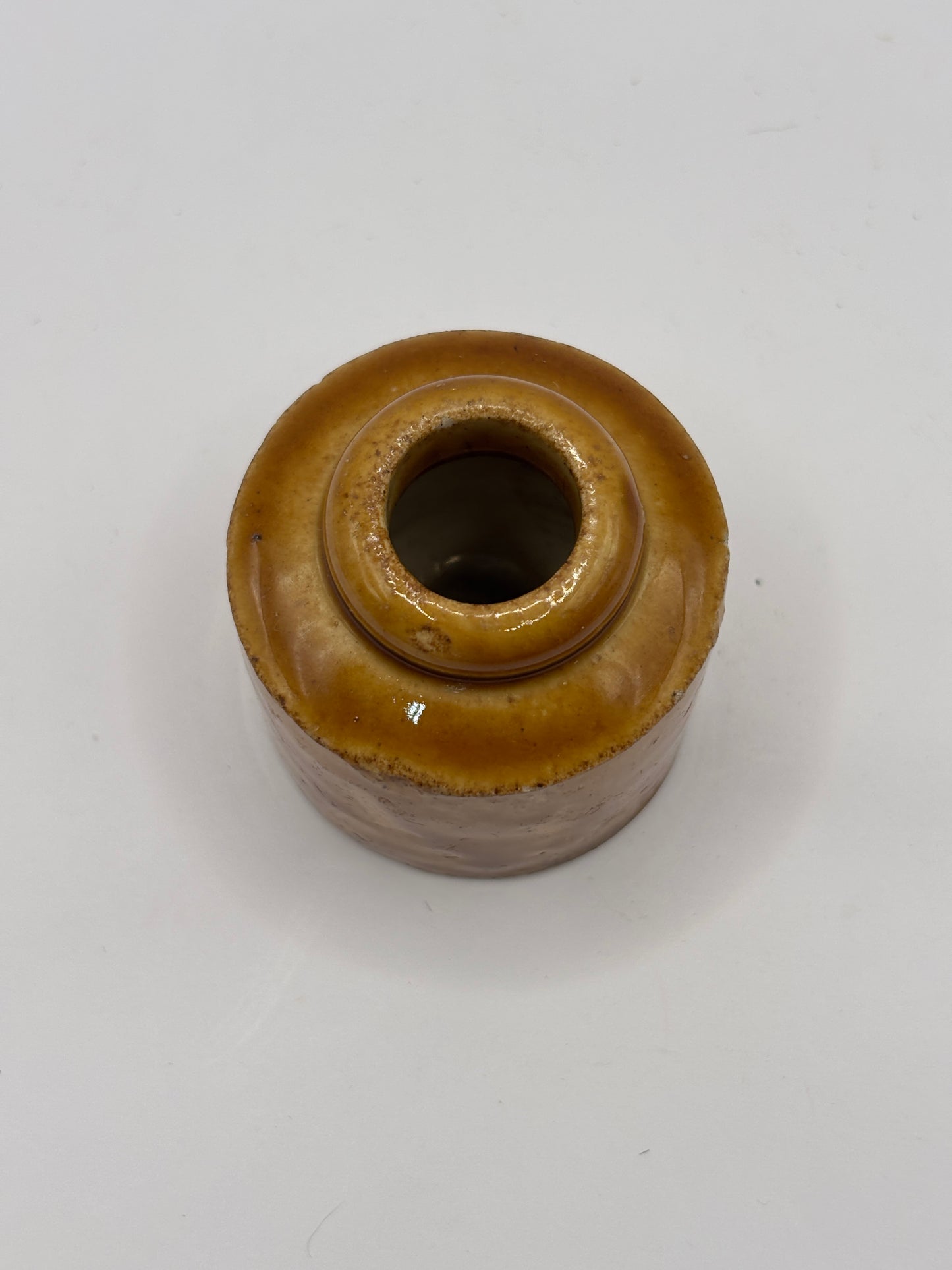 Old brown stoneware inkwell, ink bottle