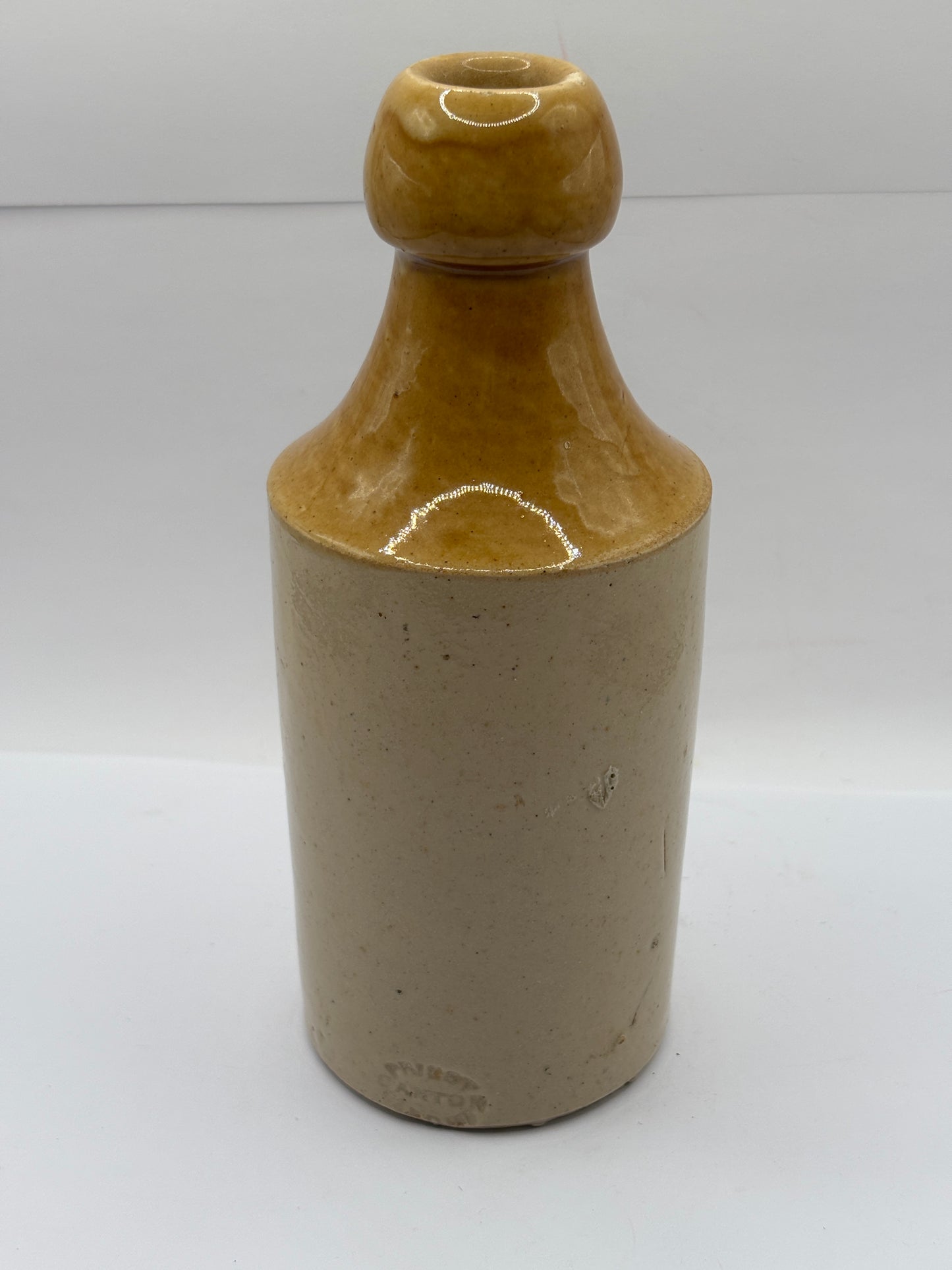 Old stoneware ginger beer bottle, Drew & Co. Oswestry