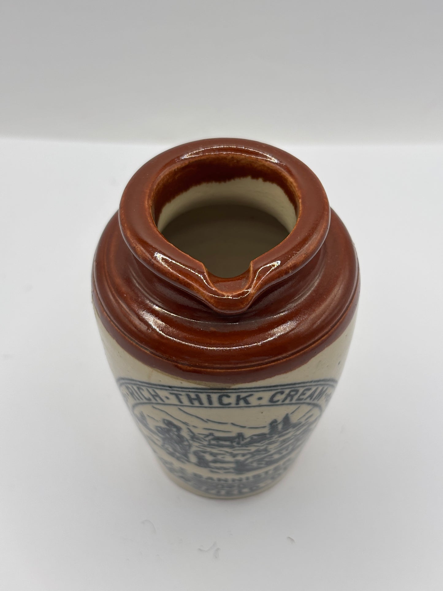 Old advertising cream pot, Bannisters Huddersfield. Damaged