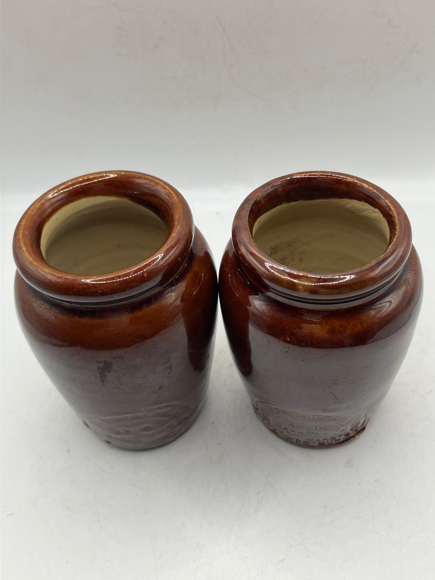 2 brown stoneware cream pots, western countries creameries