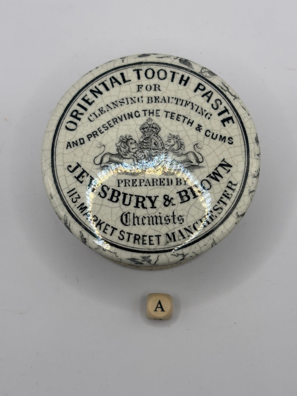 Old advertising lid and base, Oriental tooth paste Jewsbury & Brown (a)