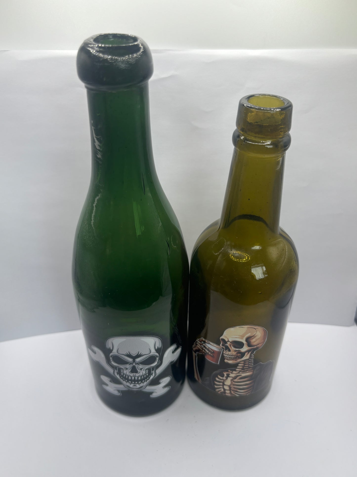 2 labelled halloween bottles