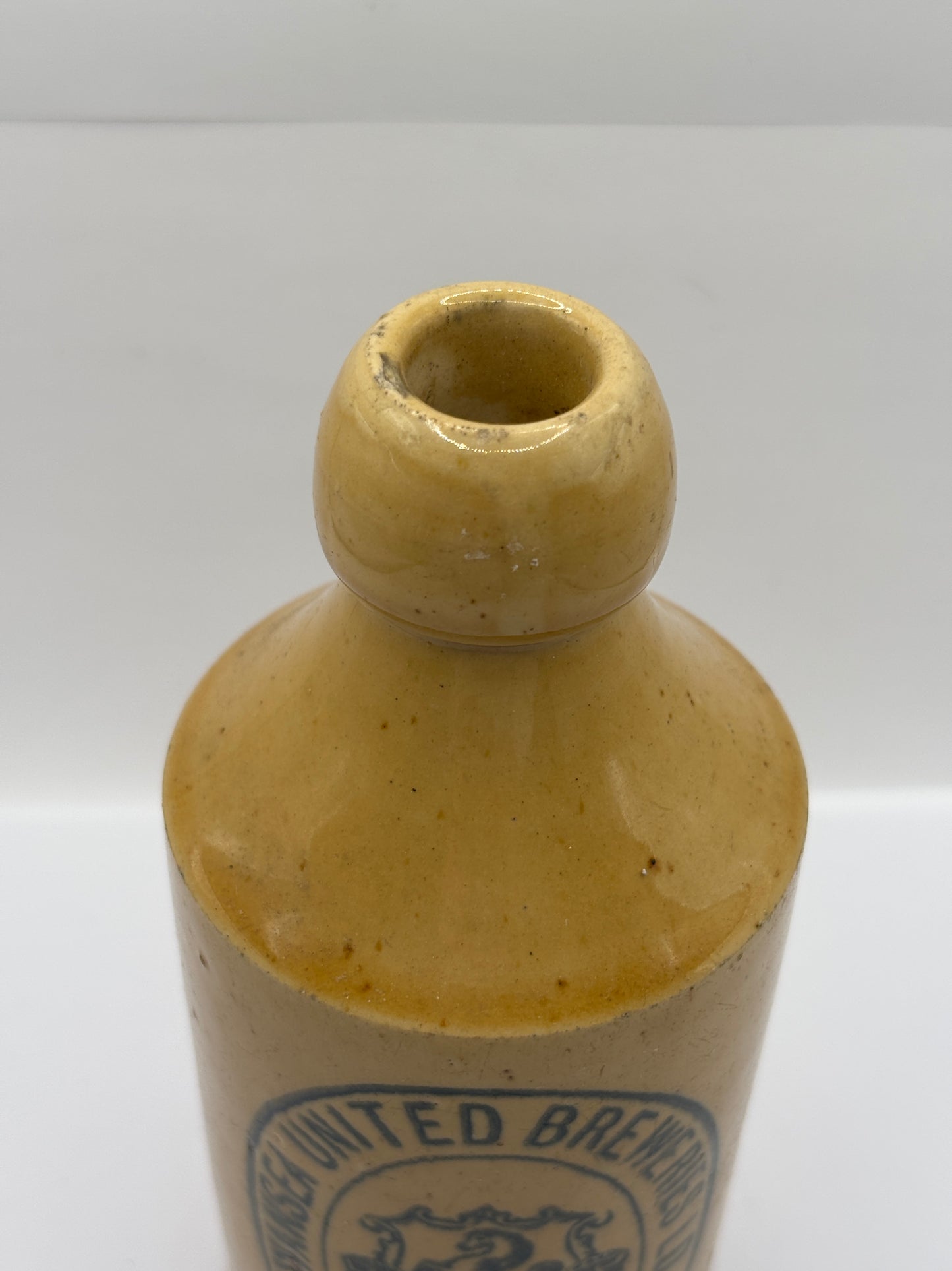 Old stoneware ginger beer bottle, Swansea united Breweries