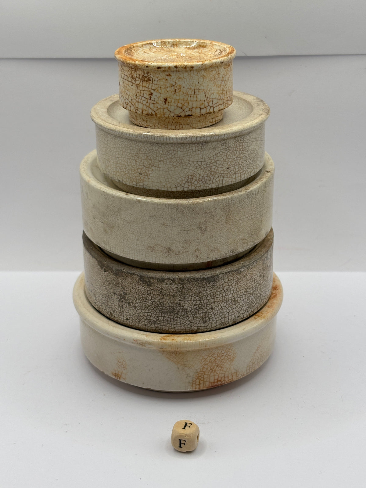 5 old stoneware pot lid bases, stackers (F)