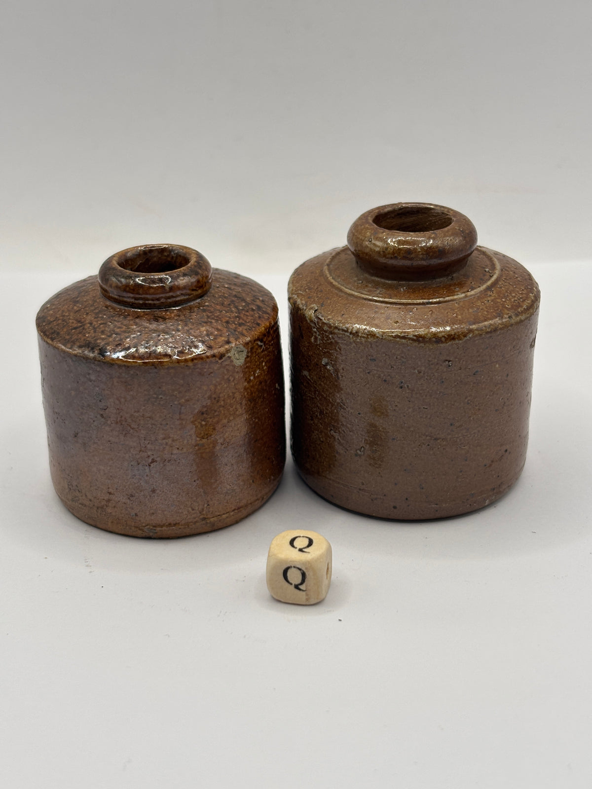 2 old brown stoneware ink bottles, inks. Pork pie ink (Q)