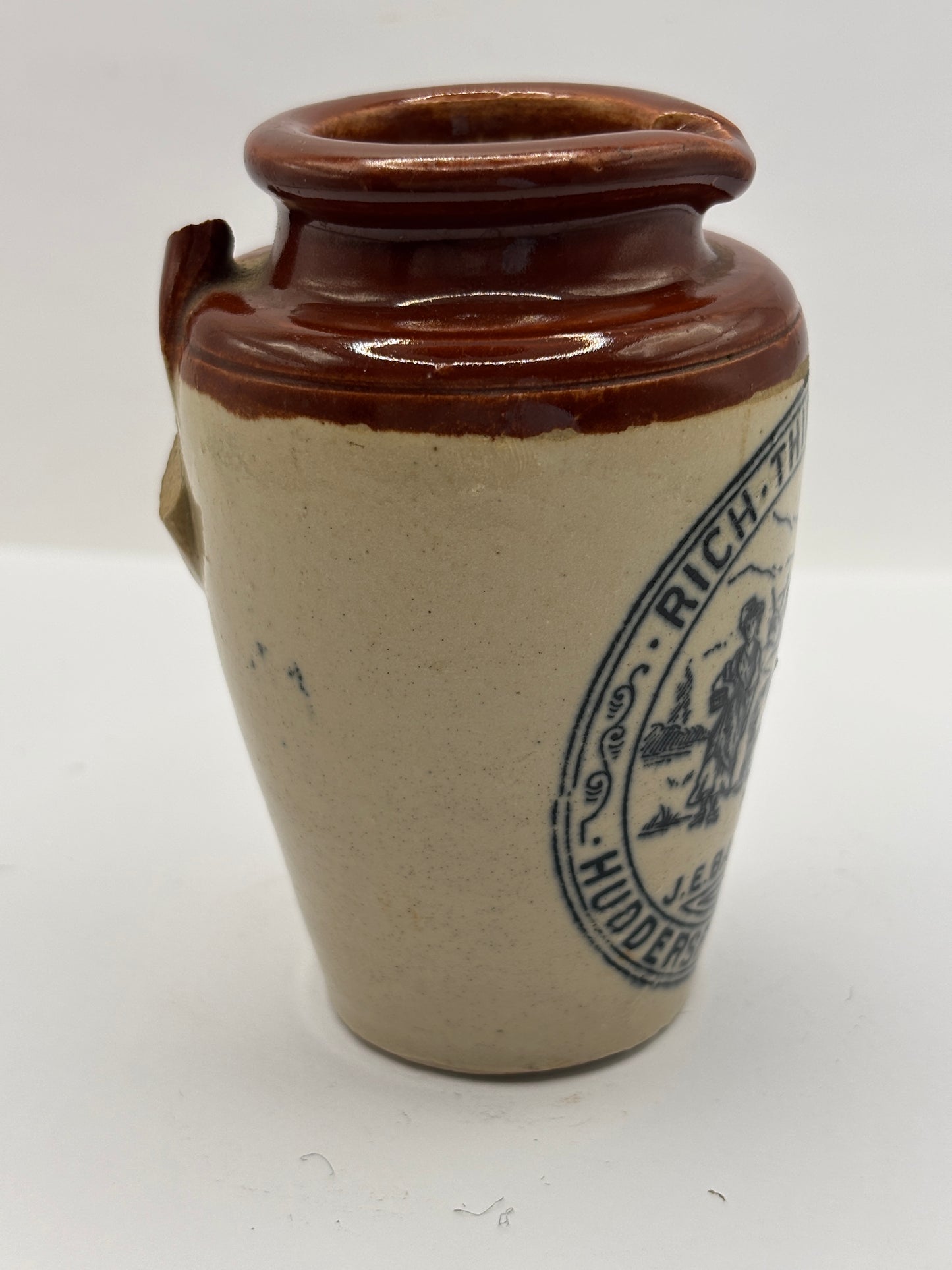 Old advertising cream pot, Bannisters Huddersfield. Damaged