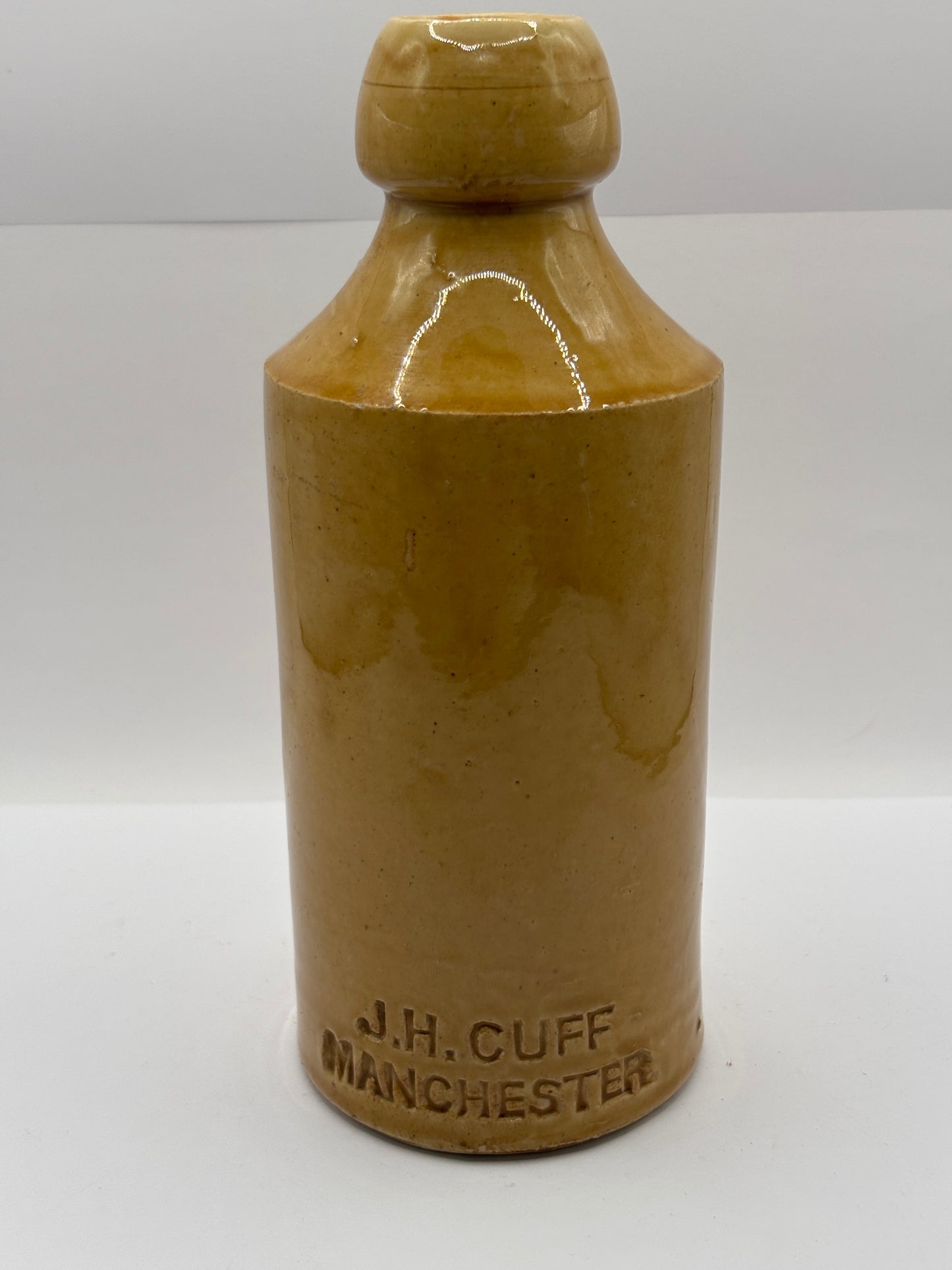 Old impressed ginger beer bottle, JH CUFF Manchester