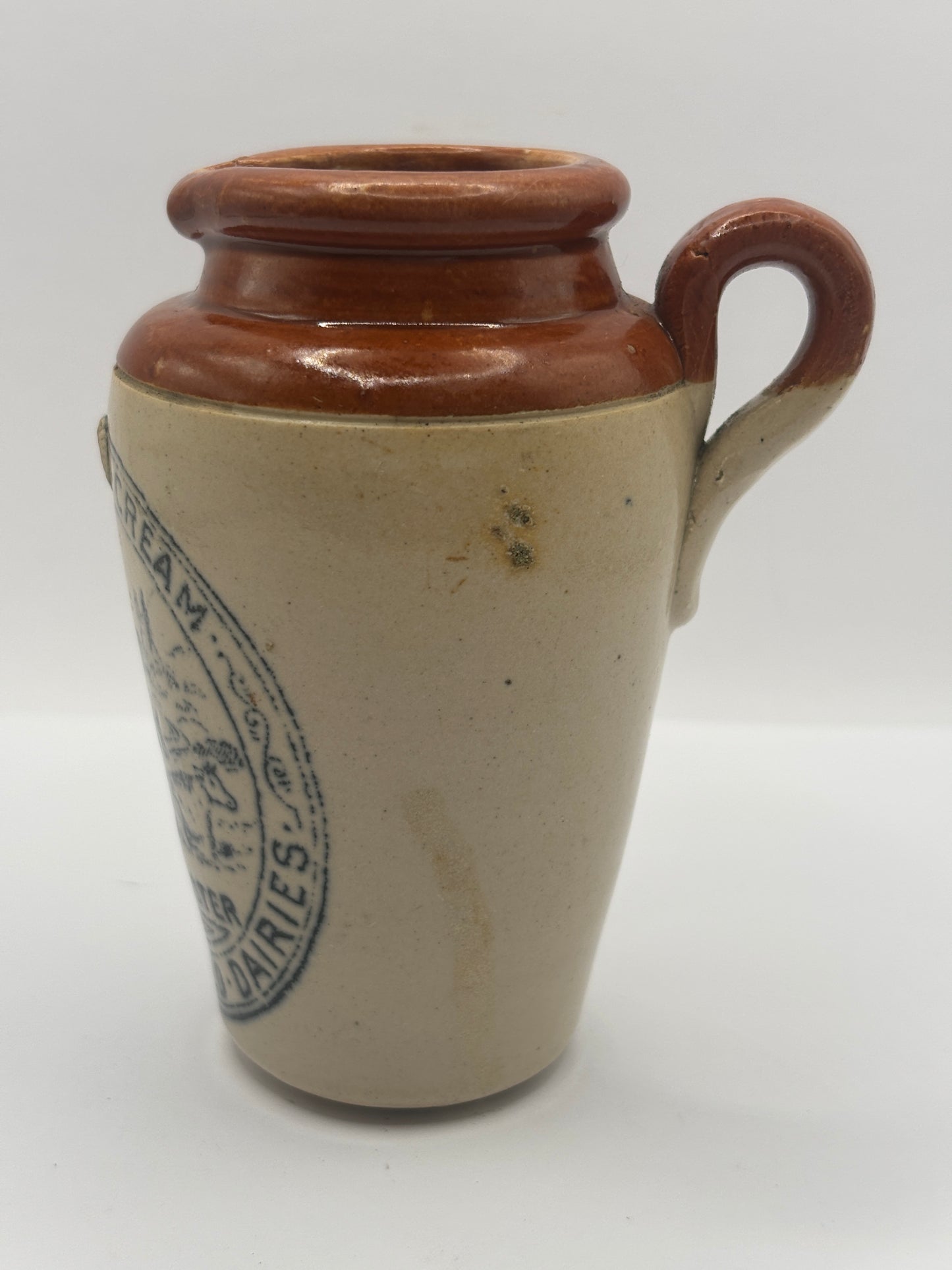 Old advertising cream pot, Peter Warner. Bannisters Huddersfield dairies. Rich thick cream