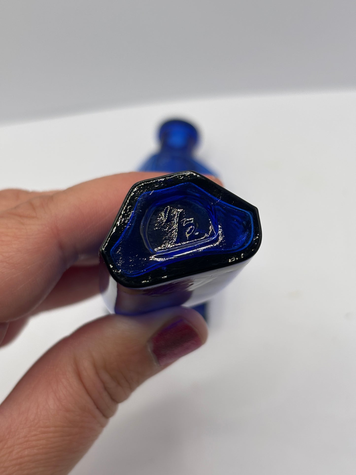 2 old blue flat back poison bottles