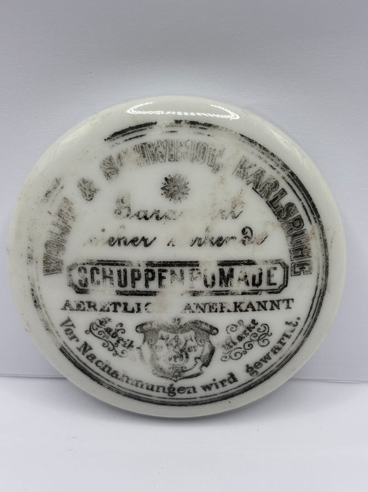 Old advertising lid. Schuppenpomade