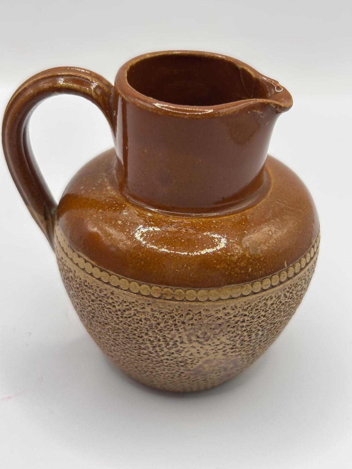 Old mini stoneware handled jug