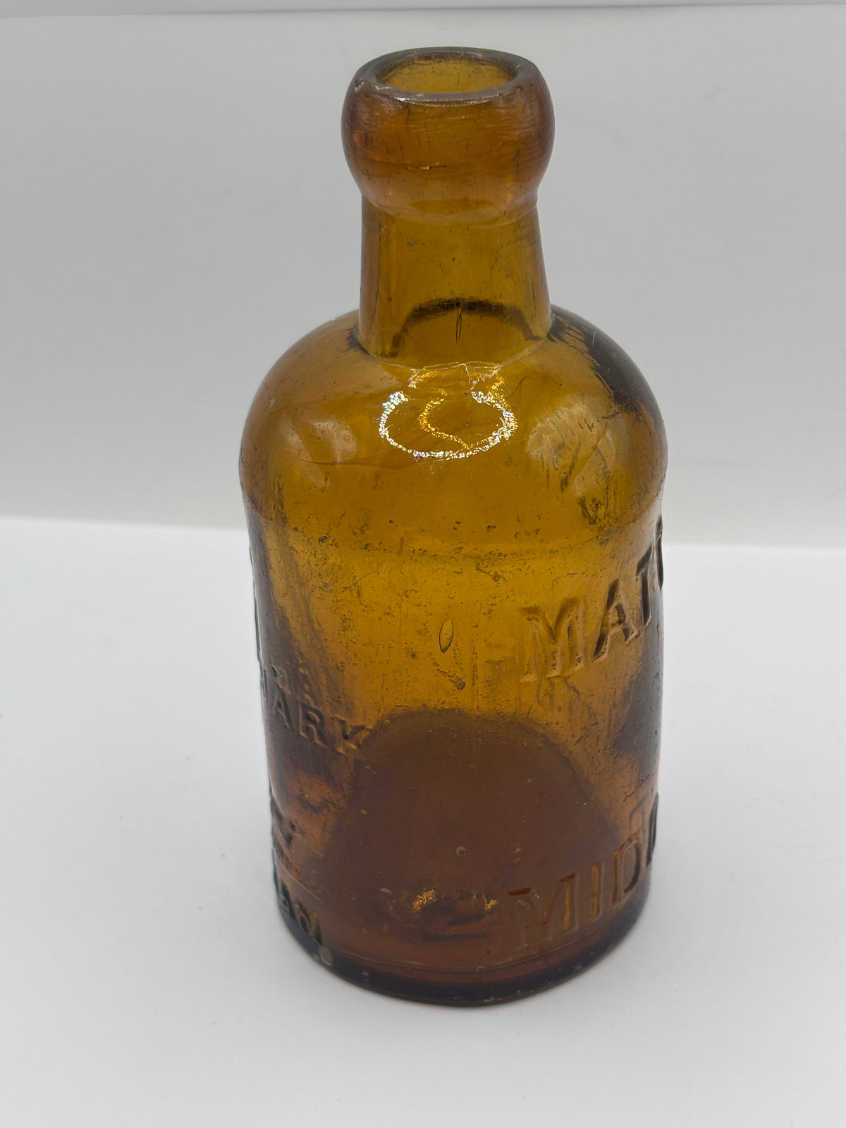 Old amber glass Middleton seltzer bottle