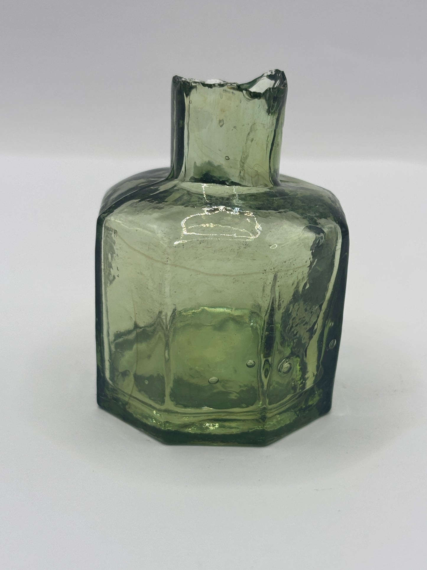Old olive green glass ink, inkwell.