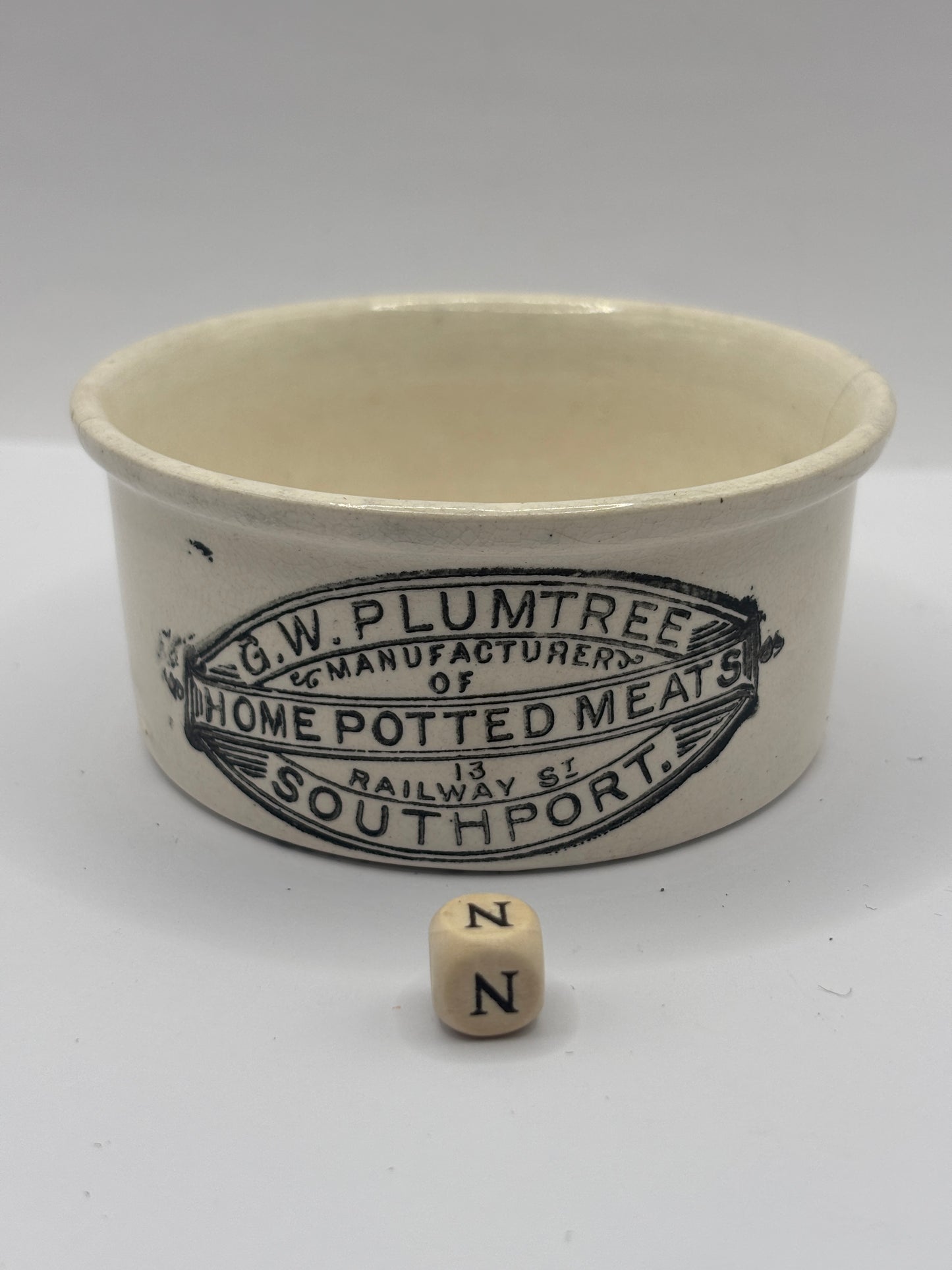 Old advertising meat paste pot, plumtrees (N) damaged