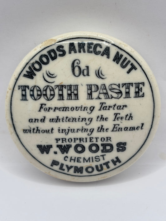 Old advertising lid, Woods areca nut tooth paste