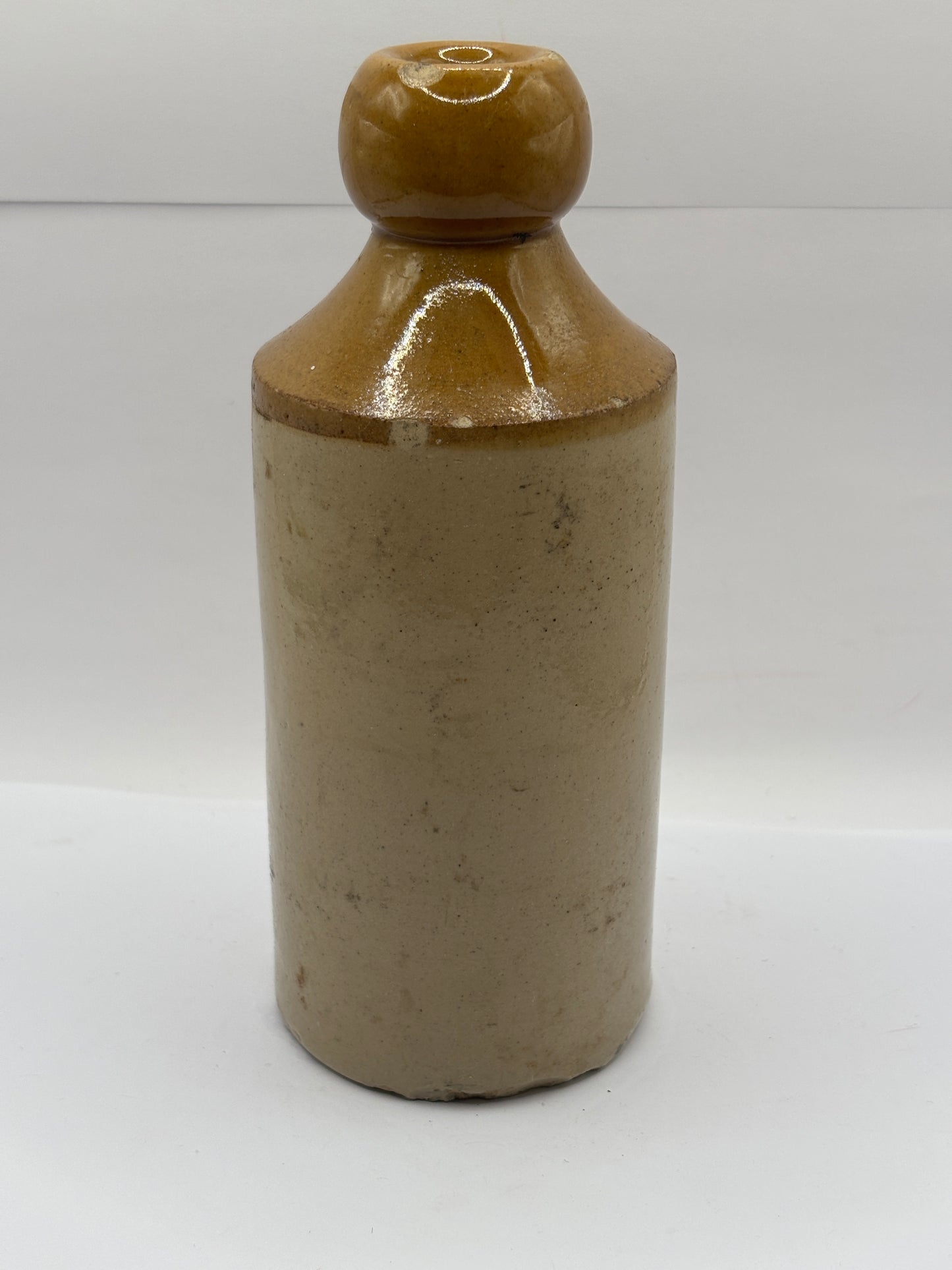 Old stoneware ginger beer bottle, Trevett’s drinks